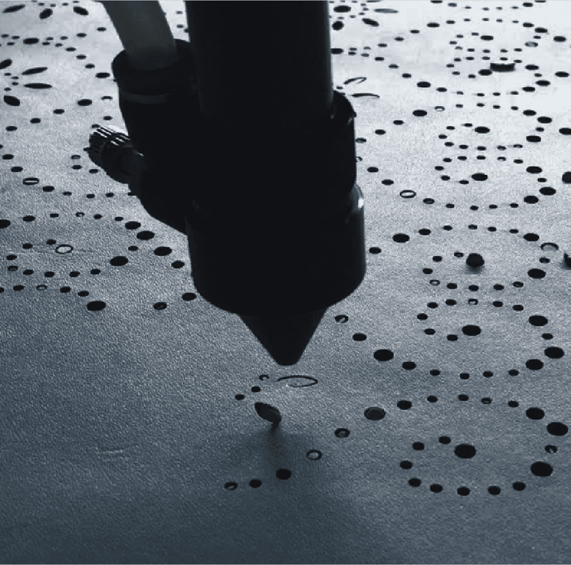 Laser cutting a pattern into fabric