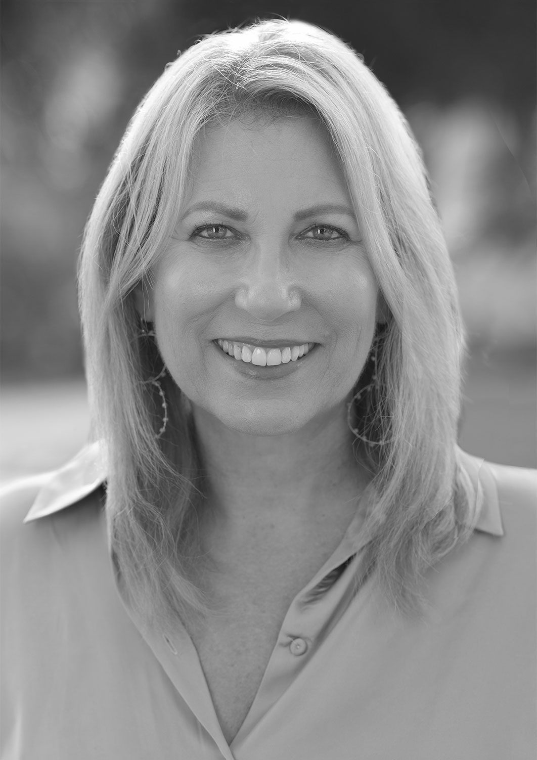 Black and white headshot of Non Executive Board Member Paula Schneider